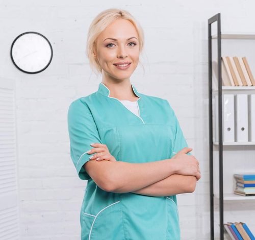 portrait-of-smiling-female-masseur-with-arms-cross-2024-11-01-00-26-59-ENRQPW7.jpg
